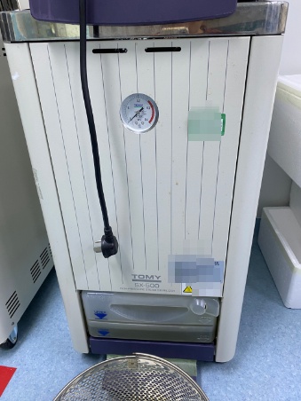 TOMY，BX-500，蒸汽灭菌器内胆上的盖子变形，图一是故障图片，图二是正常图片